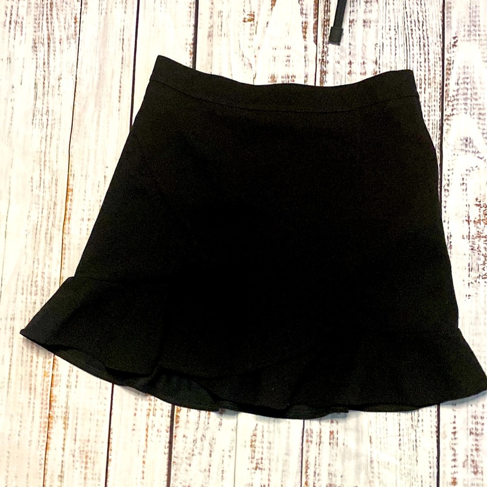 Cute black mini skirt with ruffle detail